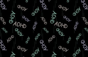 Letters ADHD repeated over and over again on a black background.