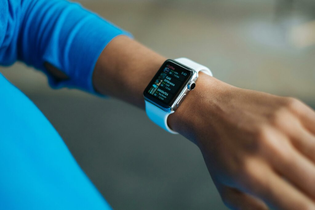 Picture of a fitness tracker on a woman's arm.